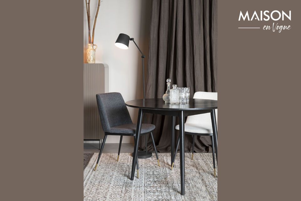 The black color accentuates the wood grain, giving this piece a refined yet robust look