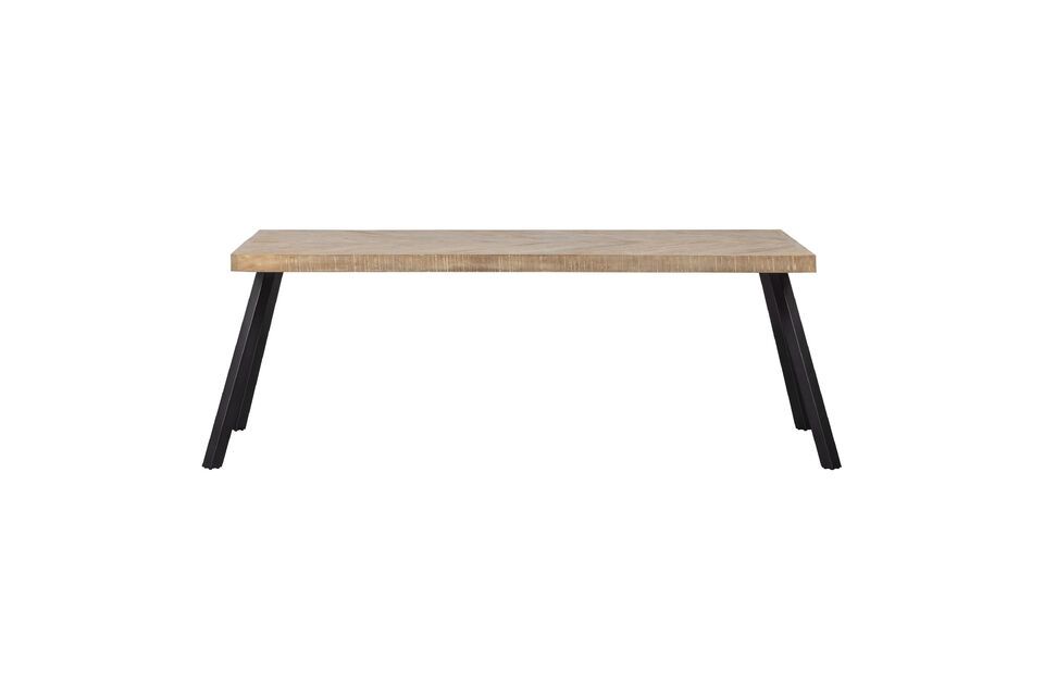 The curved edges of the table top add a touch of originality to the overall design of the table