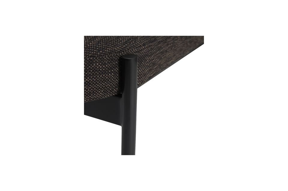 Black in color, it is upholstered in polyurethane foam