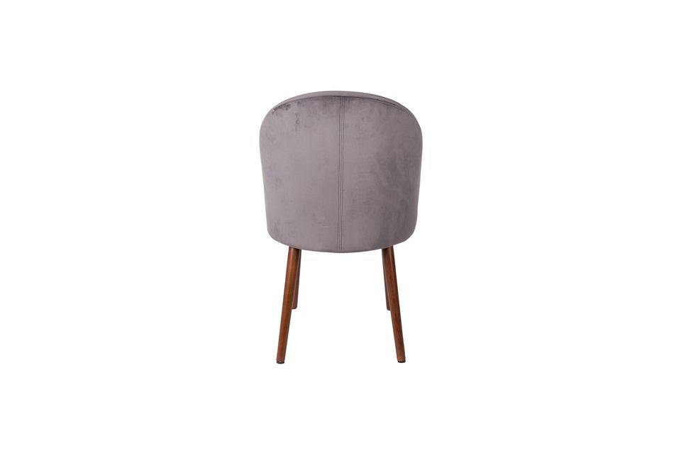 The slightly satin grey velvet and its exquisite shapes make it a very beautiful chair that will