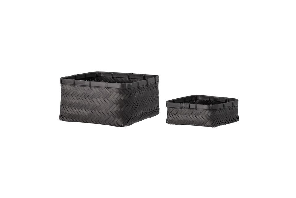 Two black baskets made of colorful bamboo that can be used for a variety of purposes