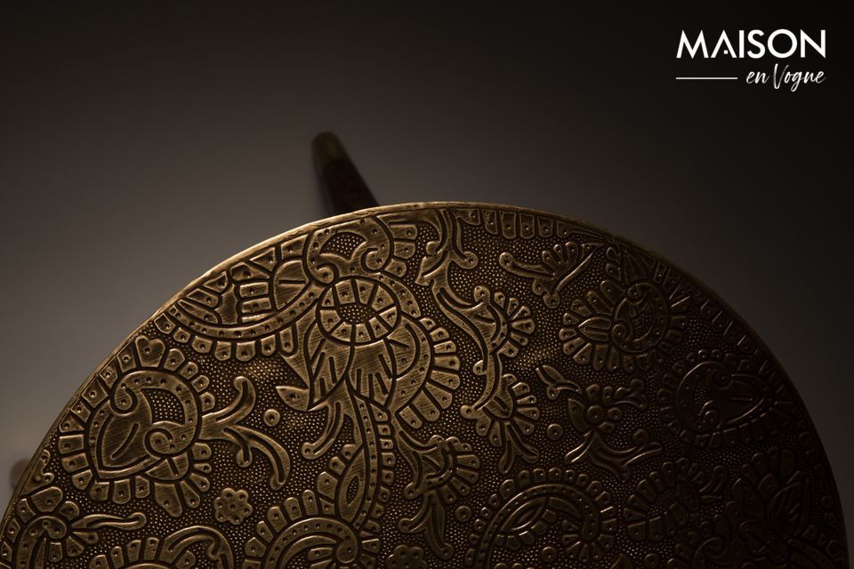 The detailing of the gold metal end pieces completes an elegant piece of furniture with an ethnic