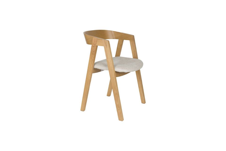 The dialogue between the soft beige of the seat and the deep hue of the dark wood legs creates a