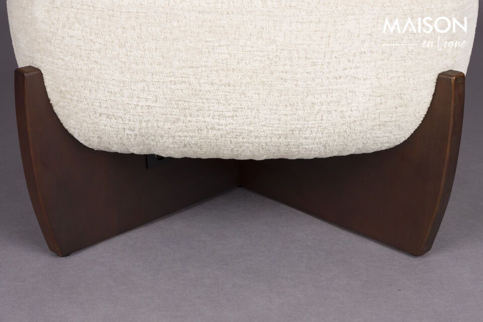 The beige Emilius fabric pouffe evokes a cozy pause in a world that\'s both contemporary and