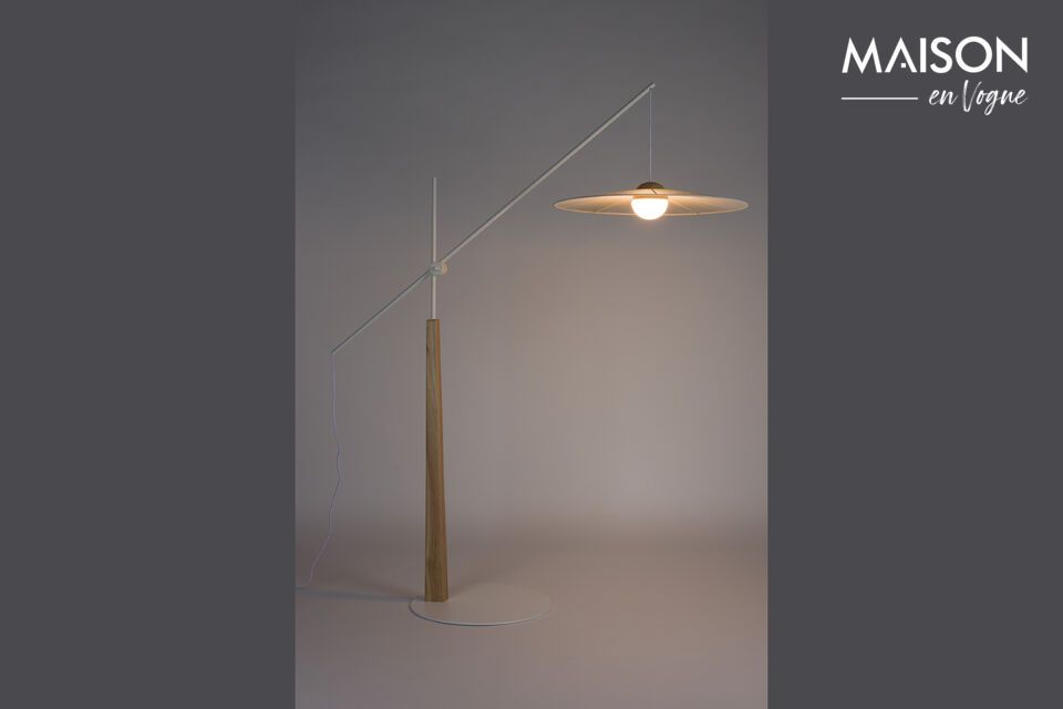 The Belle beige iron floor lamp evokes a timeless delicacy, yet with a modern edge
