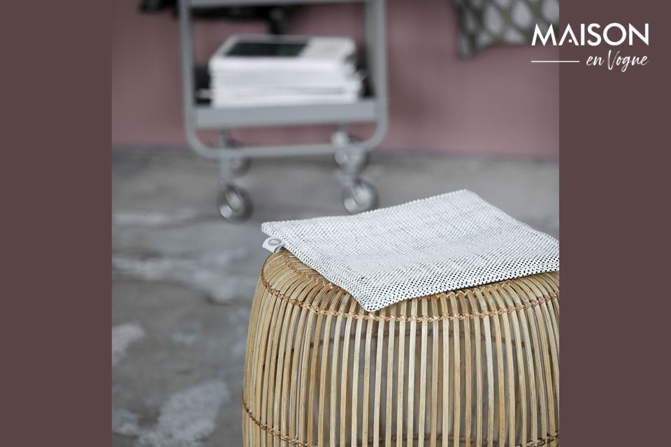 This beige rattan stool