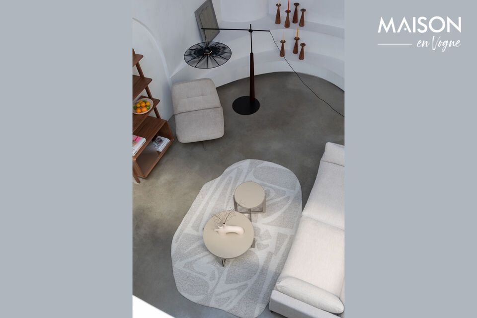 Imagine a living room where minimalism meets timeless elegance: the Centre beige steel coffee table