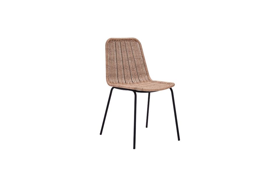 This elegant chair combines a beige wicker seat with straight iron legs for an industrial look that