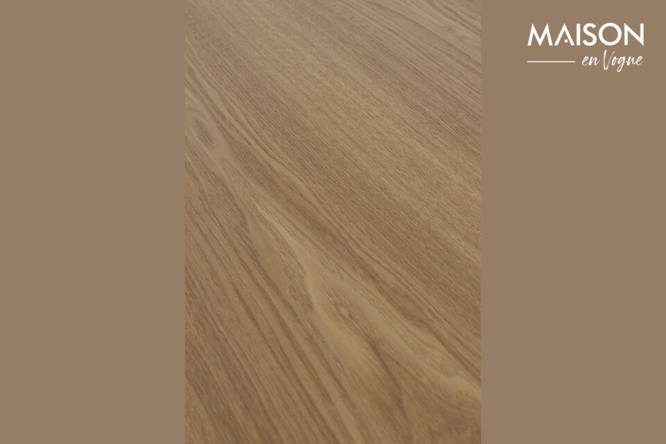 The delicate brown hue of this table seems to harmonize naturally with various styles of decoration
