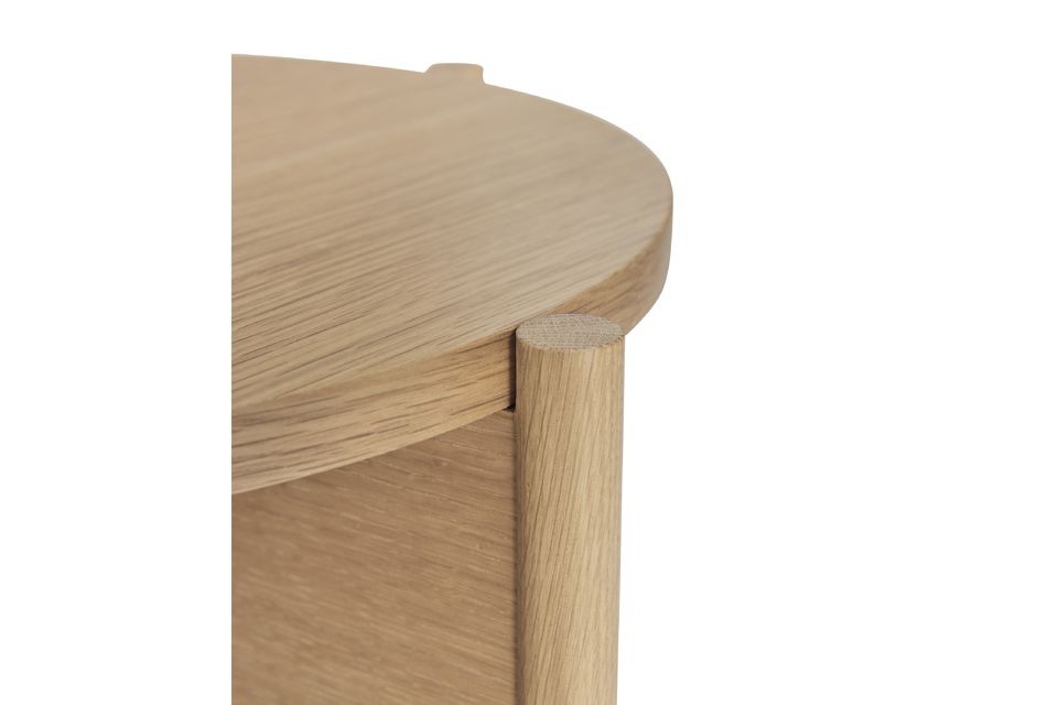 This small wooden bedside table has a simple yet modern aesthetic that makes it a great addition to