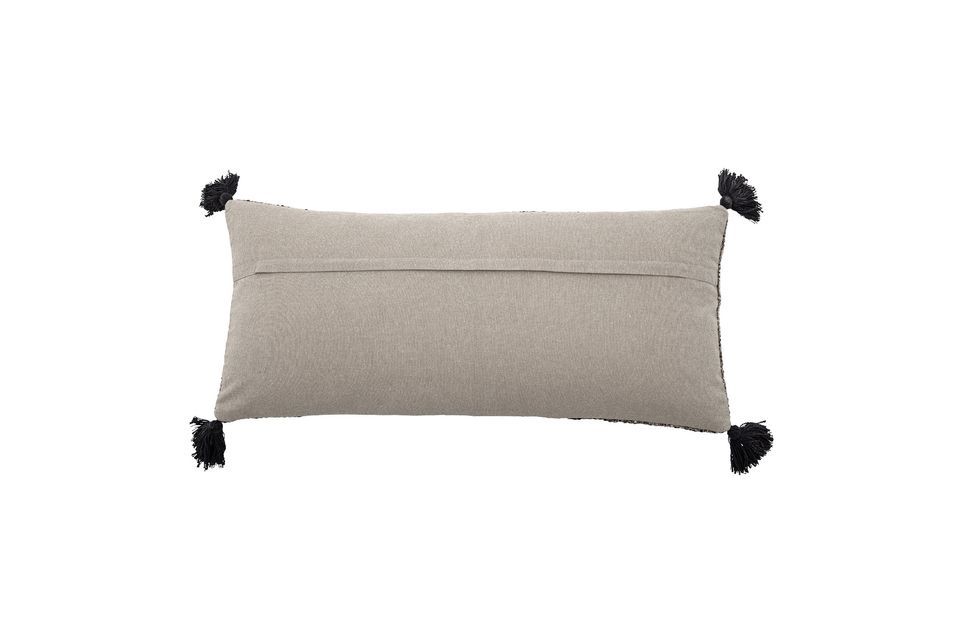 The cushion is woven from cotton and the black tassels contribute to the comfortable feel this