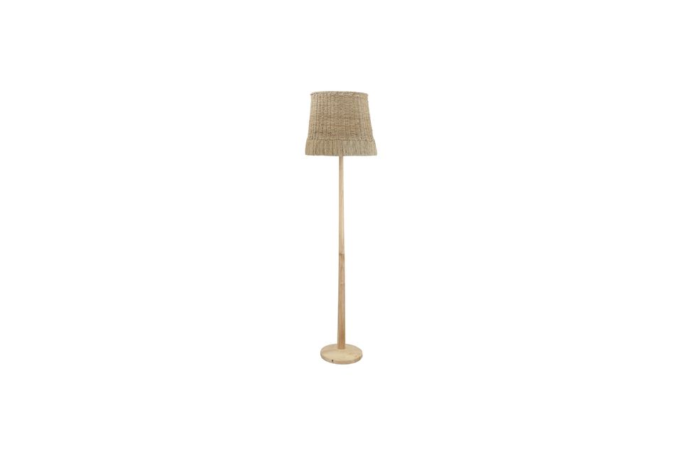 A rattan and wooden floor lamp