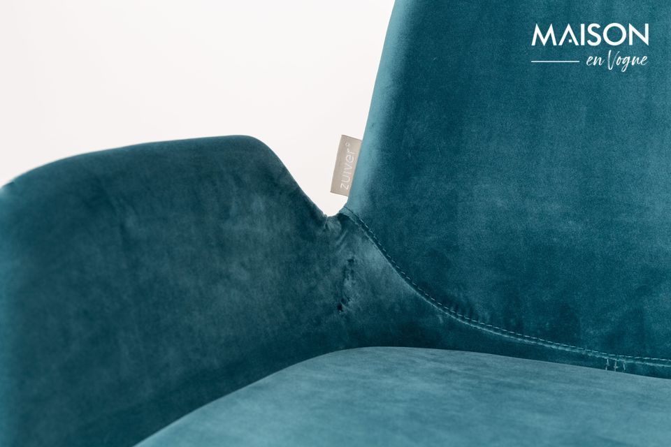 Its comfort is obvious with its foam-upholstered seat, high armrests and soft, velvety texture