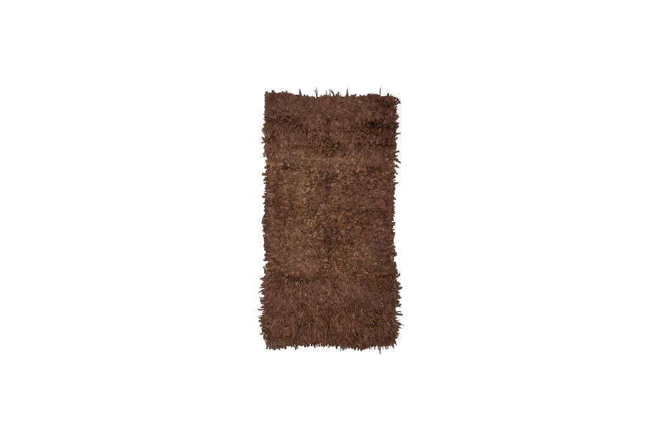The Serah rug from Bloomingville is made of brown leather fringes with a pleasant and exclusive look