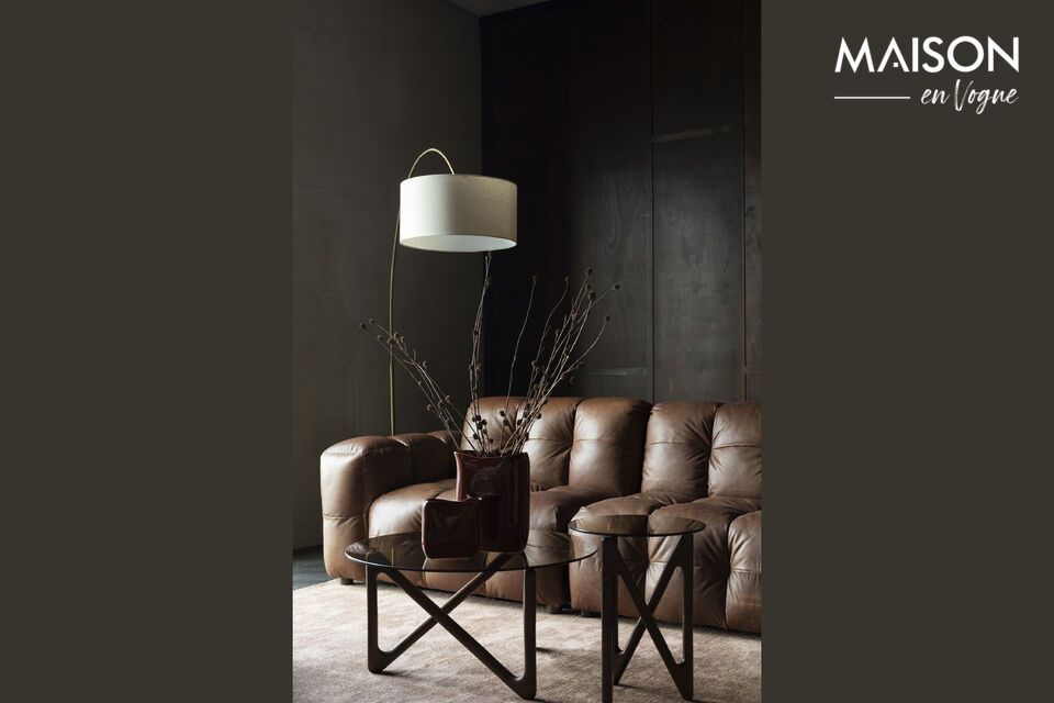 The Hackman 4-seater sofa in brown cowhide is a modular model designed to adapt easily to different