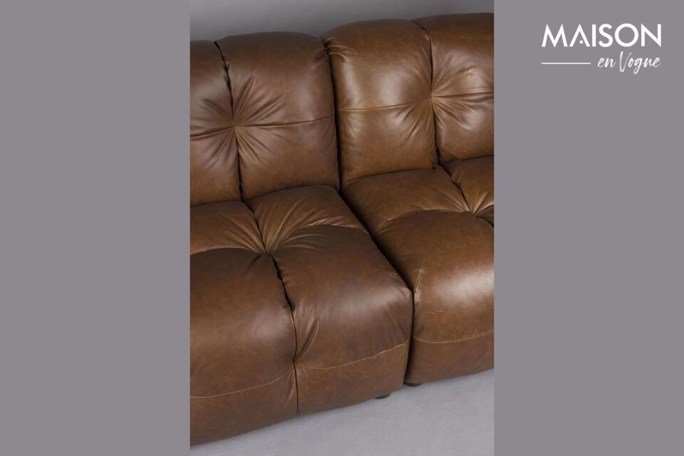Its brown cowhide leather upholstery adds an authentic
