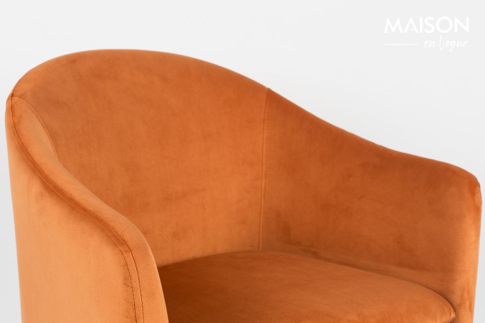 With its orange velvet upholstery and soft curves