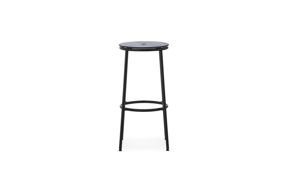 The smooth, curved edges of the seat rest on a sturdy base crafted in black powder coated steel