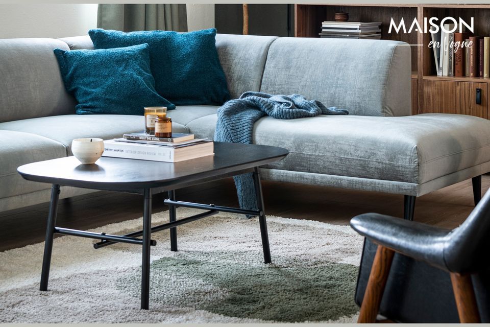 Luxury in an airy design, the Elegance mango wood and black metal coffee table lives up to its name