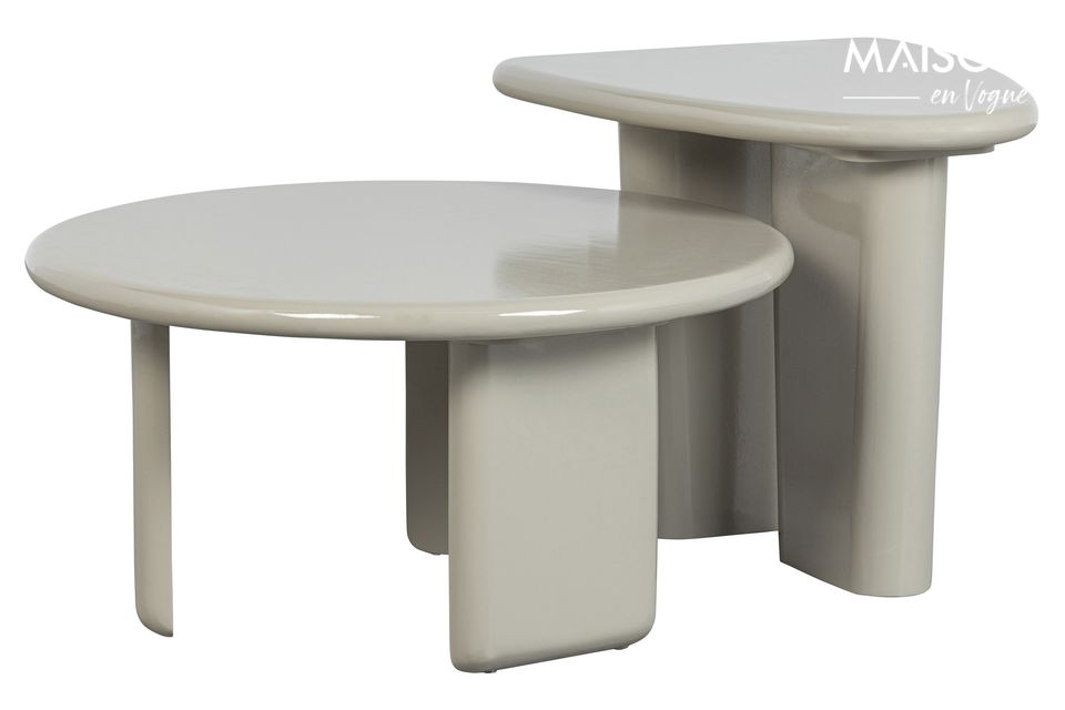 The round tabletop shape and playfully shaped legs form a beautiful design