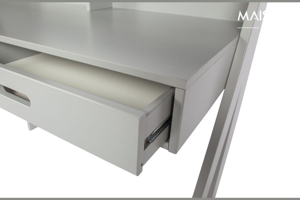 This piece features two drawers with rounded milled handles to store your work tools