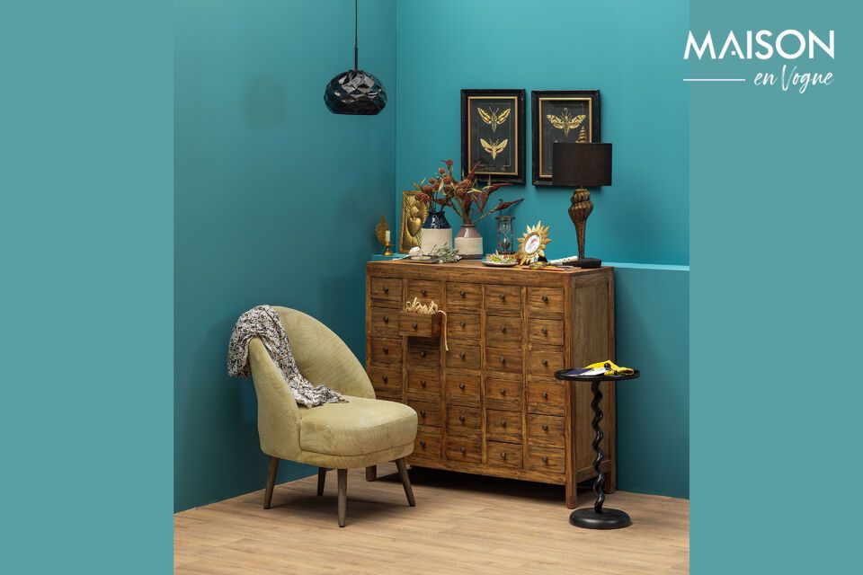 Elegance and comfort meet in this green armchair.
