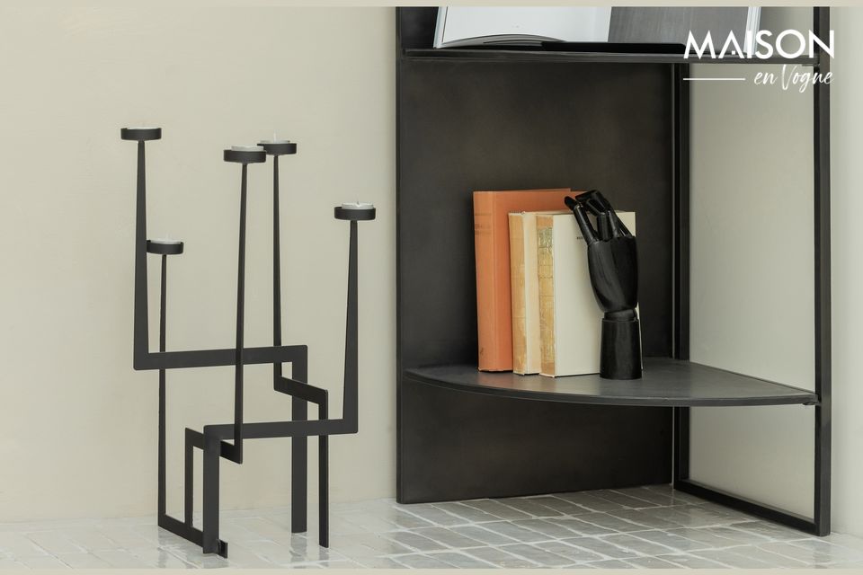 Want a modern and design object to decorate your home? This black metal Dash candleholder designed