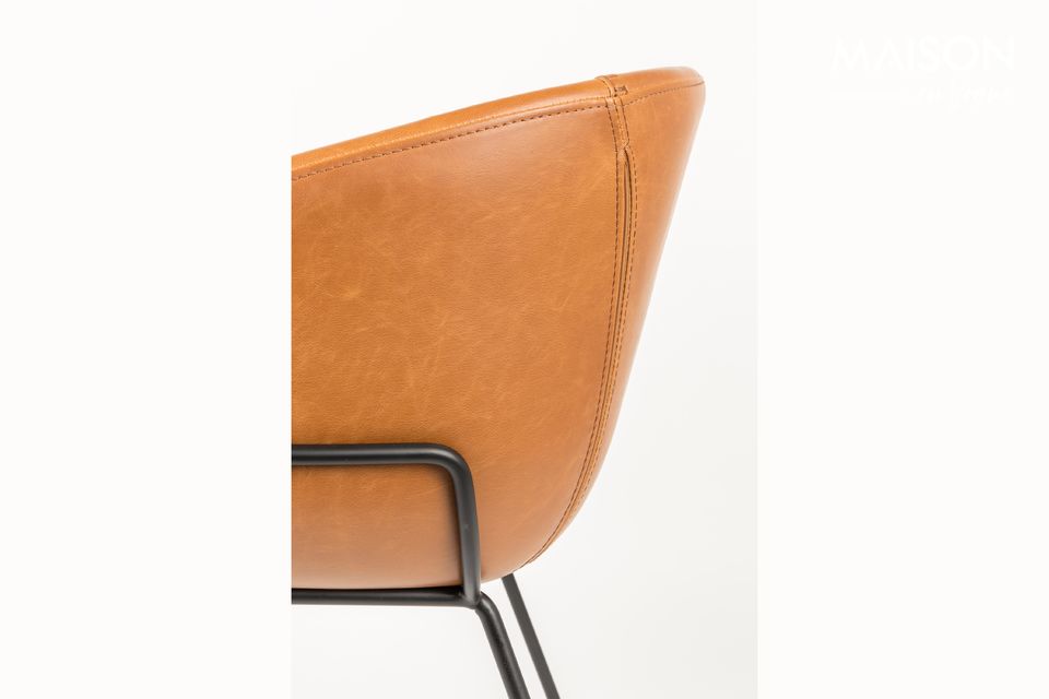 This brown PU leather armchair from Zuiver is indeed much more versatile