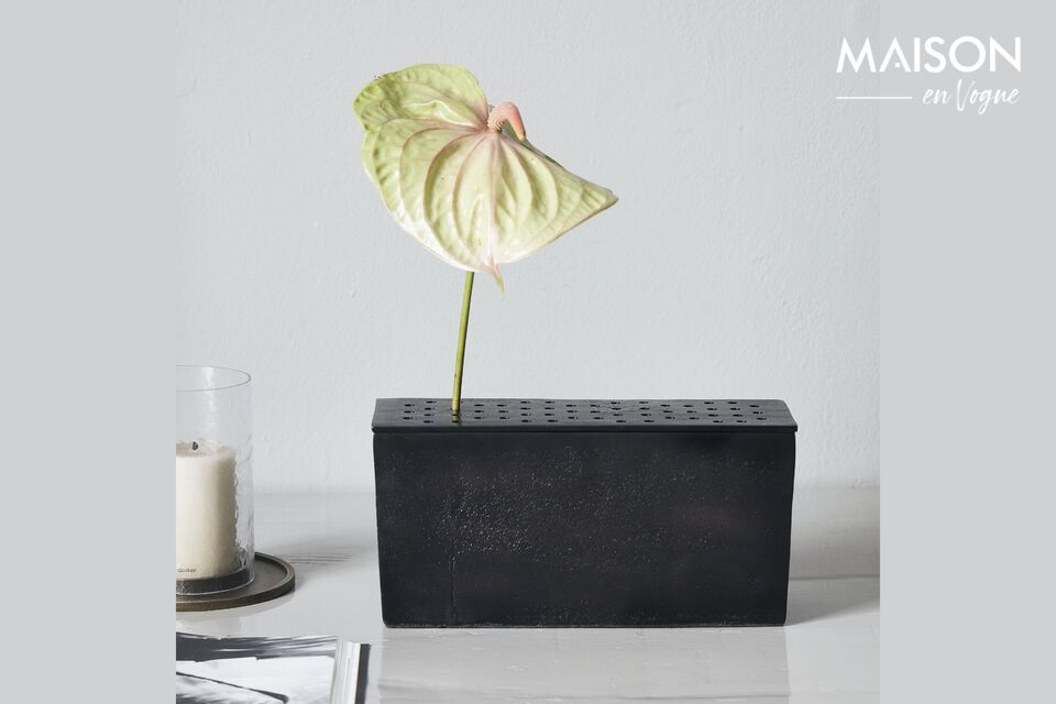Enhance the elegance of your space with the Flow vase from House Doctor