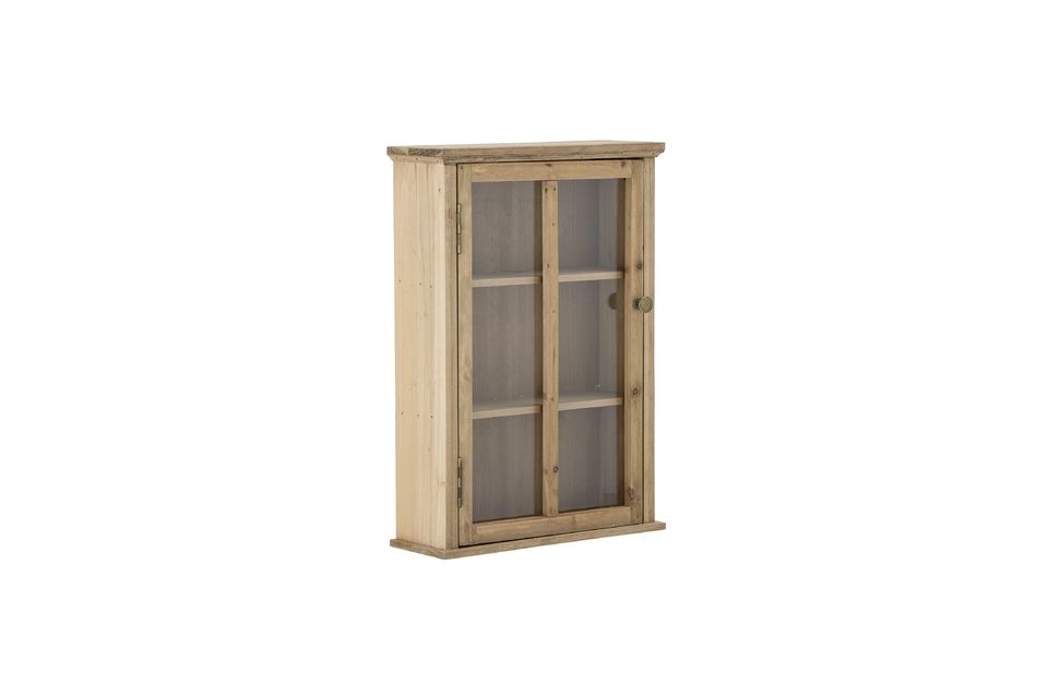 The Halden Cabinet from Bloomingville is a classic cabinet made of brown fir and closed with a glass