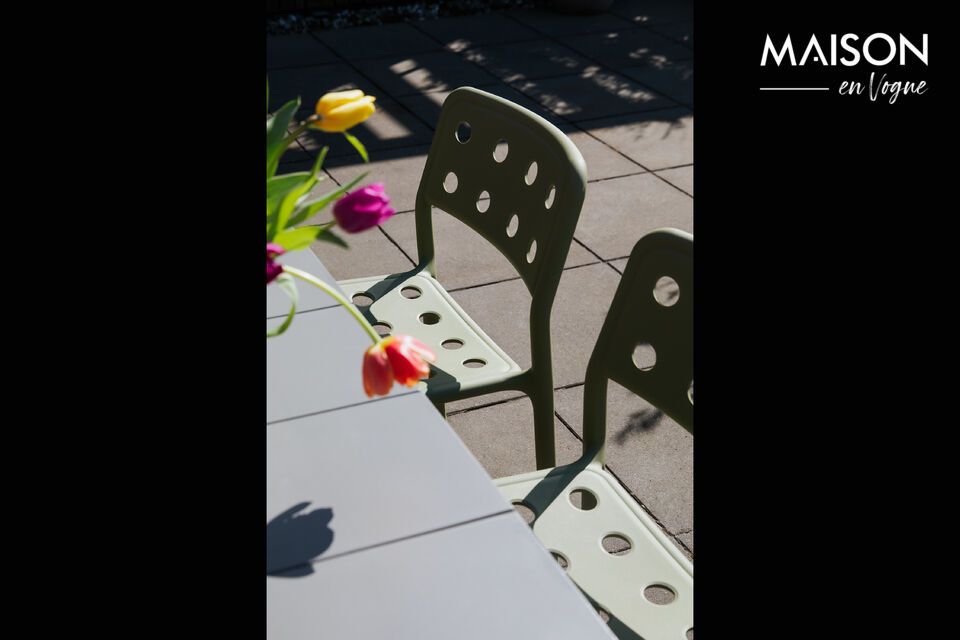Give your outdoor space a sparkling note with the Serra Green Polypropylene Plastic Garden Chair