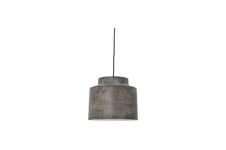 It is a heavy grey metal lamp that adds modernity to any room you place it in