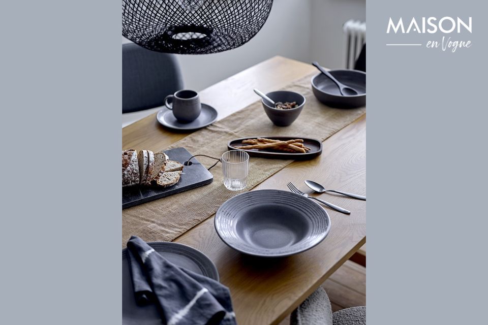 The new Raben dinnerware is made of stoneware and covered with a glossy dark glaze