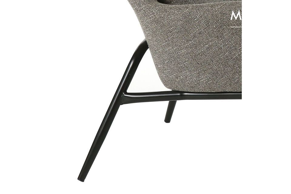 Offered in a subtly mottled fabric in light gray, here is the Hailey armchair