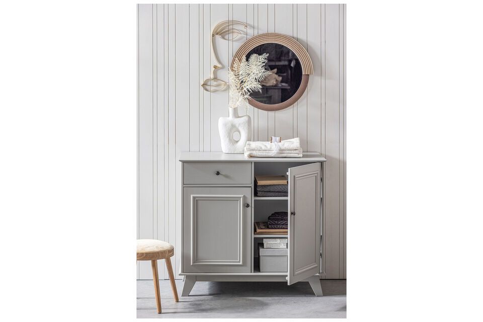 Add a warm and playful touch to your home with this Hailey large round mirror