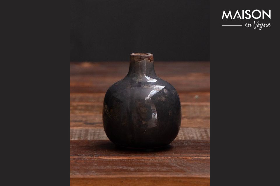This small ceramic vase will easily find its place in your home