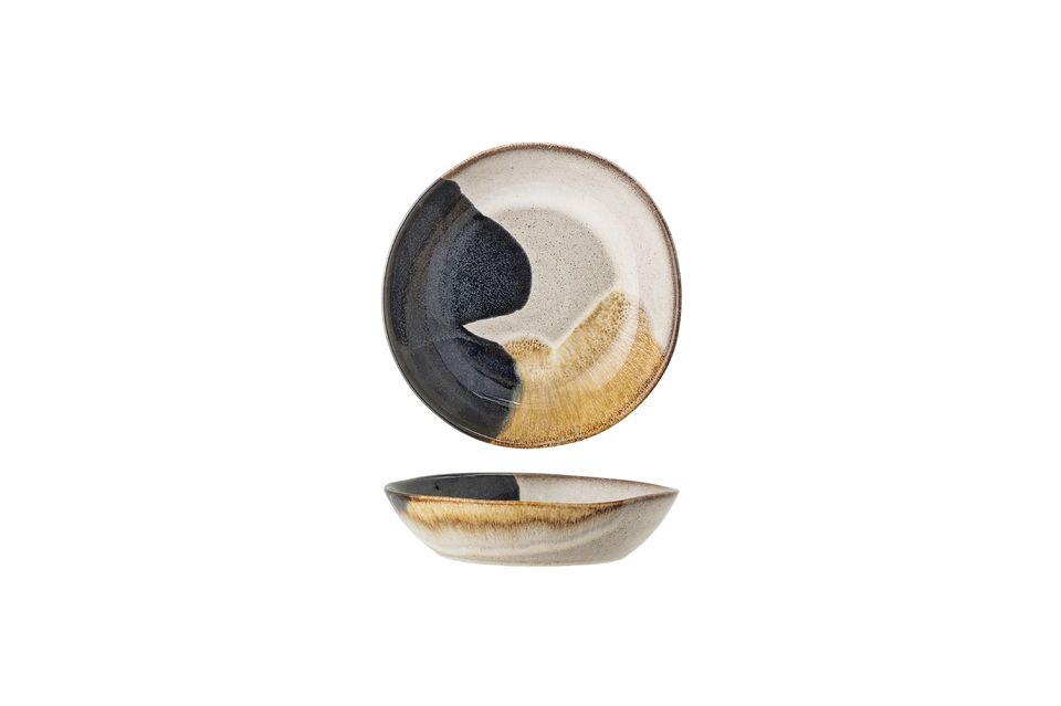 Its hand-crafted stoneware design makes it a unique piece with elegant colour variations