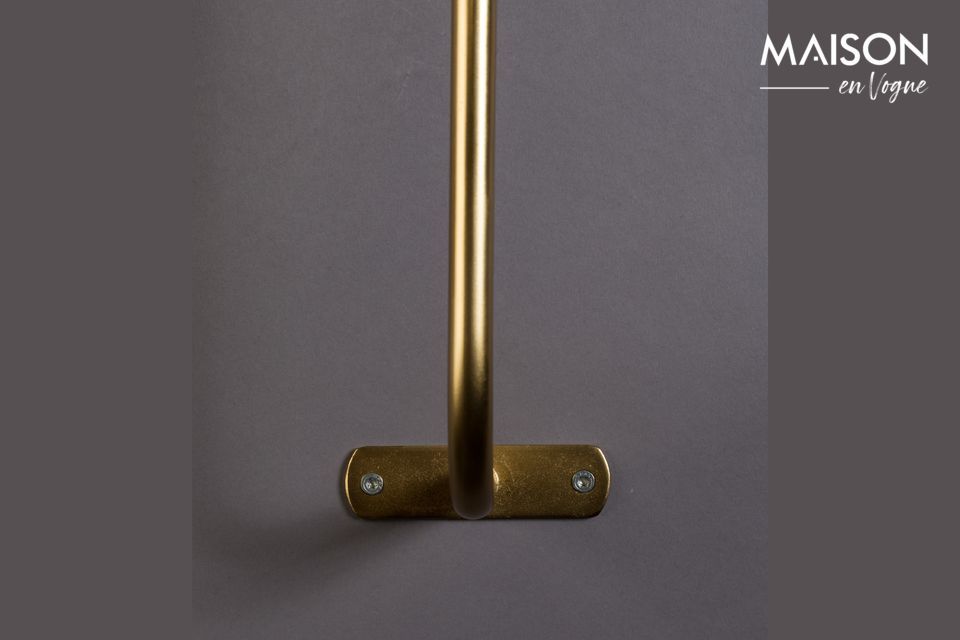 This wall light with its deliciously retro charm is made of golden brass