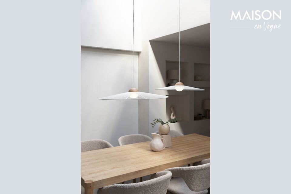 Its warm beige hue diffuses a soft light