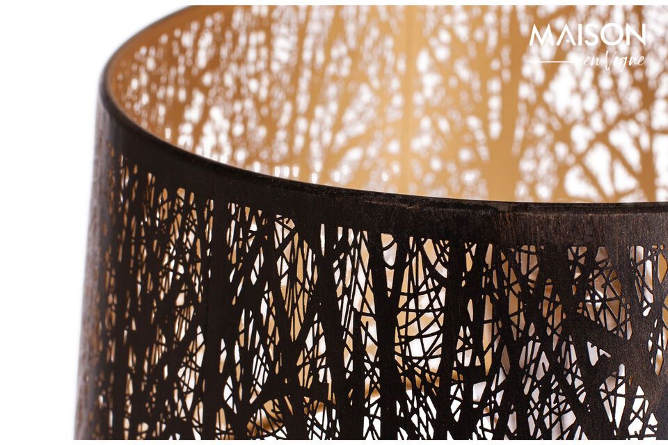 The decoration of the shade consists of silhouettes of trees and branches
