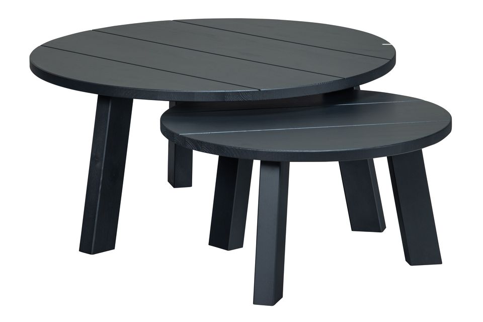 Made of solid Scandinavian pine, the table has a solid black matte wood look