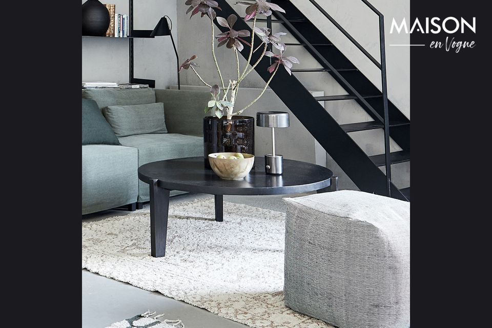A coffee table is nowadays one of the essential elements of a living room
