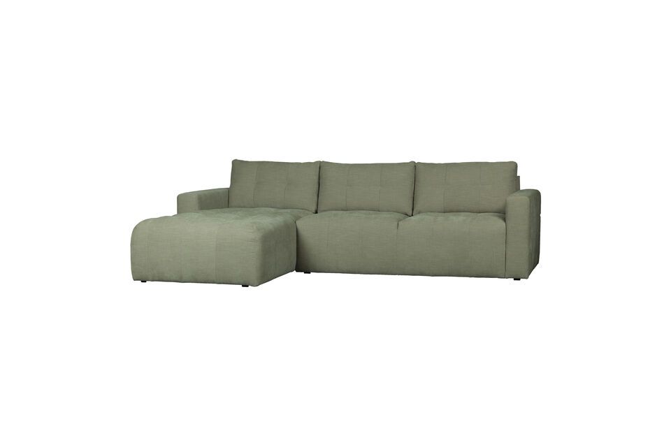 Upholstered in a soft fabric with a faded look, this sofa is not only comfortable but also stylish
