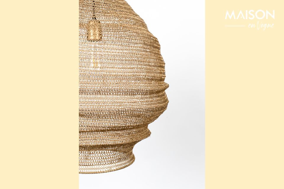 This hanging lamp is immediately appealing because of the fine mesh surrounding it