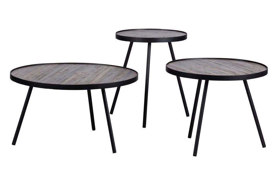 Reclaimed teak table tops and slim metal legs give this set of three tables a light and airy look