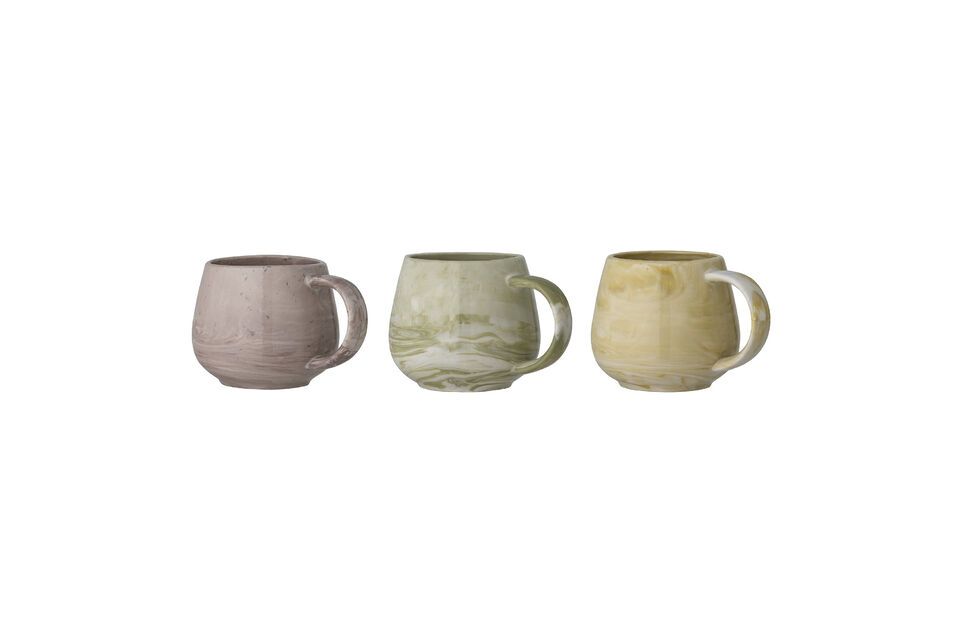 3 pieces of stoneware with beautiful watercolor effects in different colors and a light pattern on