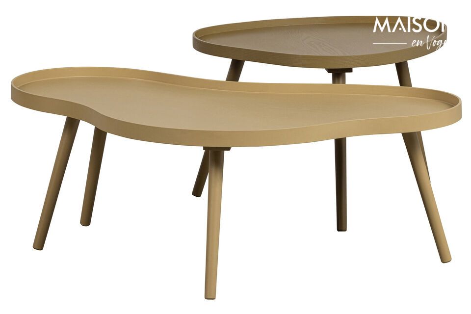 The Mae beige wooden side table captivates with its organic shape