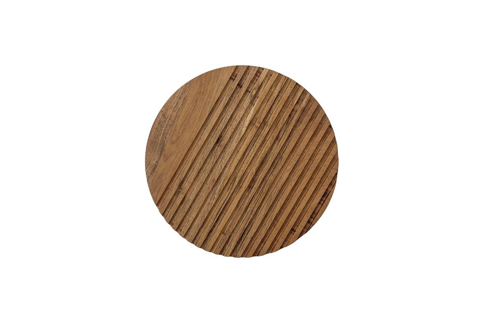 Bloomingville\'s Dotta cutting board is a pretty, organic, round mango wood design