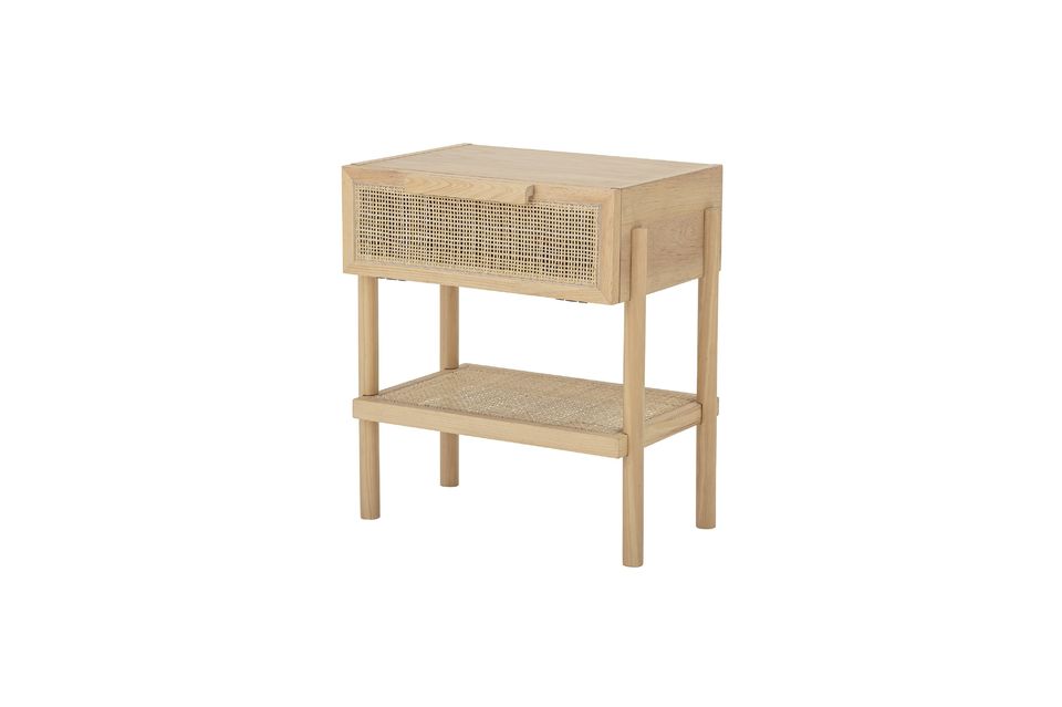 It is made in a nice combination of pine, rattan, and veneer for the covering
