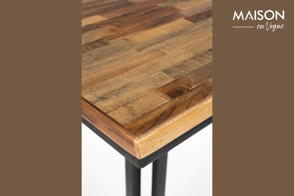 A bistro table in recycled teak with adjustable plastic glides
